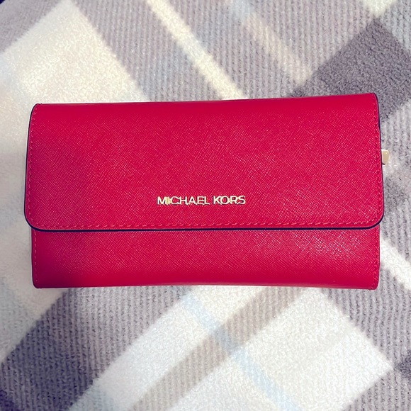 Red Michael Kors wallet.